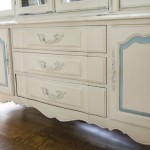 bottom half of antique hutch painted in Annie Sloan Old Ochre and duck egg